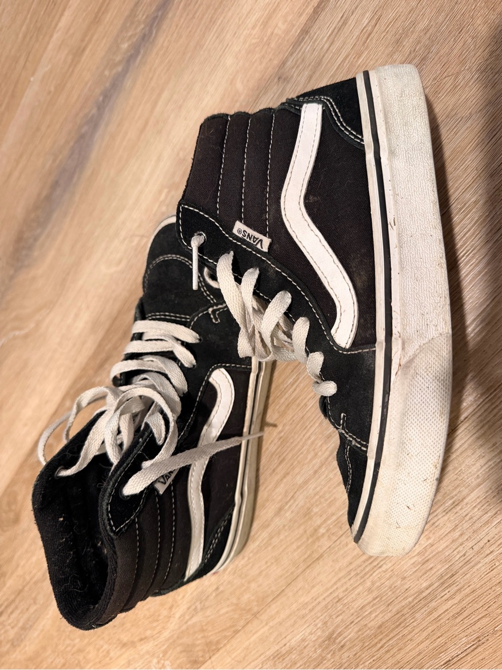 Vans Black and White High-Top Skate Sneakers